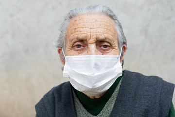 Elderly woman with mask