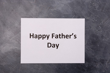 Happy Father's Day text on grey background. Free space. Space for text. Father's day holiday concept. 