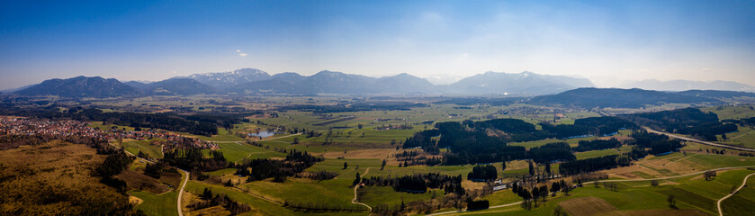 Penzberg city in bavaria. Aerial Panorama. Starnbergersee Lake. Alps with look at Herzogstand, Zugspitze and home garden from the foothills landscape around Penzberg