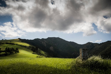 Sun rays illuminating the hills