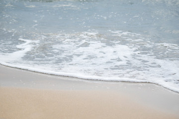 Fototapeta na wymiar Soft blue Adriatic sea waves on clean sandy beach.holiday or relax in summer concept