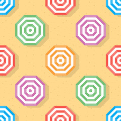 Top veiw of umbrella seamless pattern background. Colorful umbrella on sand beach. Hexagon repeat background.