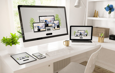 Fototapeta na wymiar responsive devices on home office setup