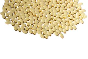 Softgels of Omega-3 on whight background with copy space. Fish oil on a white background. Yellow capsules with medicine. Medical medicament of polyunsaturated fatty acids. Macro top view