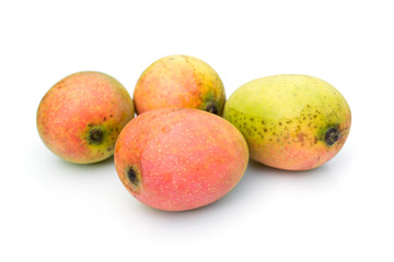 Sweet mango fruit isolated on white background.