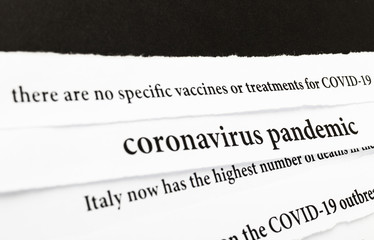 Coronavirus breaking news headline clippings from various newspapers reporting on the deadly disease.