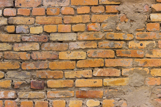 
Dilapidated Brick Wall With Partial Collapse