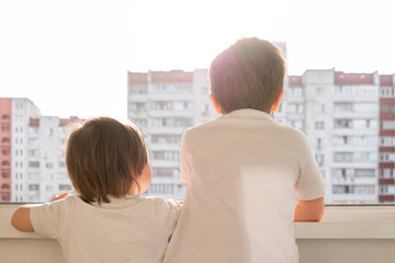 Children are forced to be at home during quarantine related to pandemic of covid-19, siblings are...