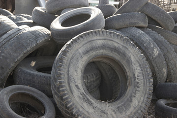 
Old worn tires of various vehicles, rubber recycling