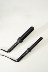 Curling irons on a white background