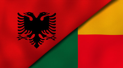 Fototapeta premium The flags of Albania and Benin. News, reportage, business background. 3d illustration