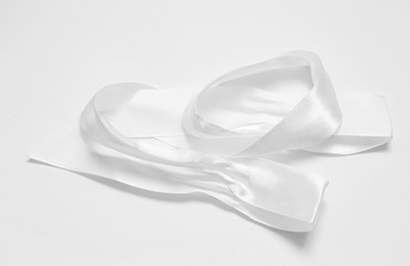 White ribbon isolated on white background