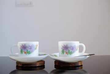 Indian tea cup glass on table