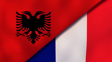The flags of Albania and France. News, reportage, business background. 3d illustration