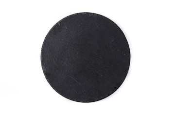 Empty black round slate plate isolated on white background