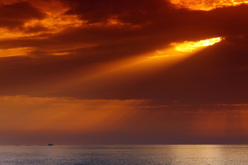 The rays of the sun over the  Corsica  mediterranean sea