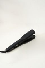 hair iron on a white background