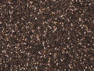 Texture chia seeds as background. Top view or flat-lay. Healthy superfood. Copy space for text.