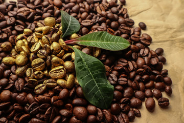 Golden and brown coffee grains on brown paper