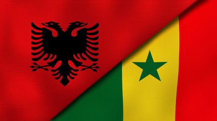 The flags of Albania and Senegal. News, reportage, business background. 3d illustration © Maksym Kapliuk