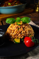 rustic bulgur fried with minced meat and vegetables