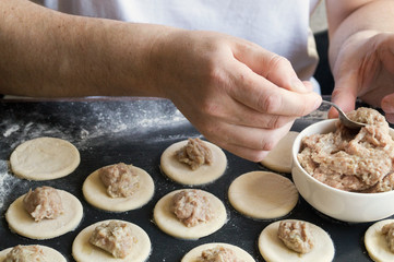 dough rolled out for cooking dumplings.