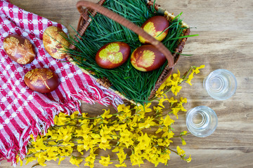 traditional Easter eggs in basket painted by boiling in red onion leaves - organic food