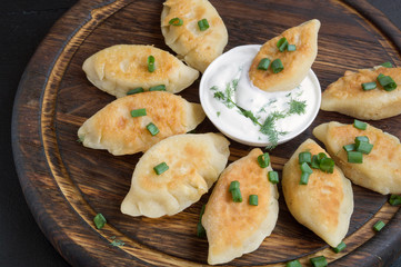 fried dumplings with sauce.