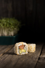 Sushi stand on old wooden boards