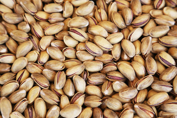 roasted pistachios close-up background