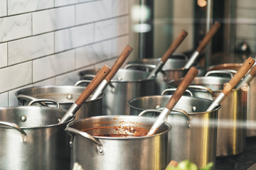 Stainless pots with ladles