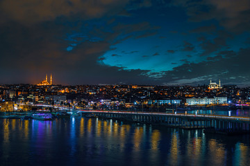 Naklejka na ściany i meble Istanbul urban down town road traffic view during twilight with amazing city lights long exposure
