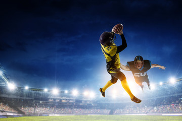 Obraz na płótnie Canvas American football player in action