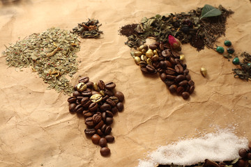 Map of world made with various sorts of tea and coffee
