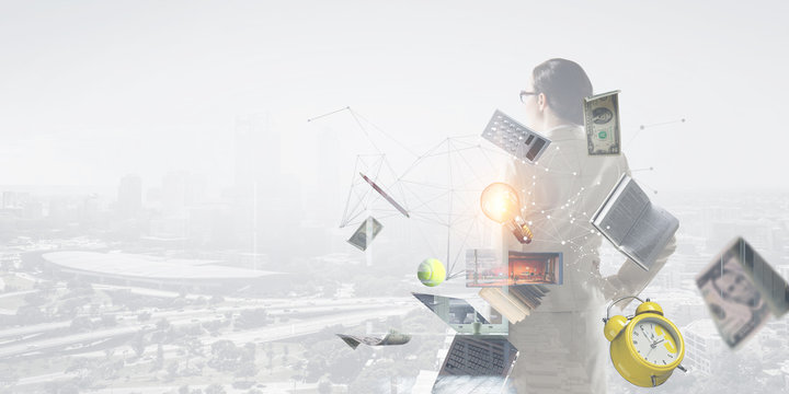 Rear view of the business lady who is looking for the new business ideas