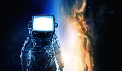Astronaut with TV head in space. Mixed media.