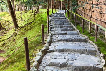 Stone pathway and stair are for walking in beautiful moss garden of Ginkakuji shrine. The Ginkaku-ji or Jisho-ji is a Zen temple in the Sakyo ward, Kyoto, Japan