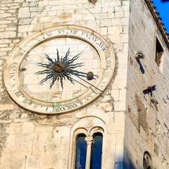 Fototapeta na wymiar SPLIT, CROATIA - 2017 AUGUST 15. Famous ancient clock tower in the old town of Split, Croatia.
