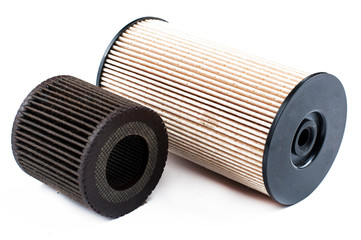 Old  and new oil filter isolated on white background.Copy space