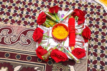 Traditional wedding ceremony in Hinduism: Turmeric in plate for haldi ceremony