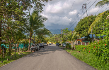 Road through the village of Uvita at the pacific coast of Costa Rica (no people)