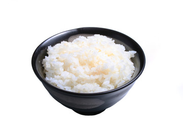 Japanese rice in earthen cup isolated on white background  