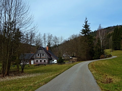 Czech Republic - view of wooden house in Antonin valley in spring near town Svoboda n / U