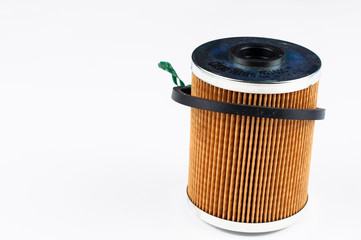 New oil filter isolated on white background.Copy space