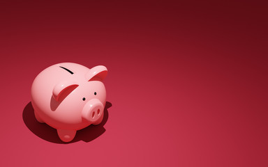 Isolated piggy bank on pink background with reflected light and shadow.