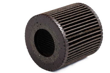 Old and dirty oil filter isolated on white background.Copy space