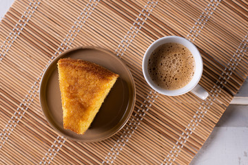Brazilian corn cake made with a type of corn flour (Fuba)