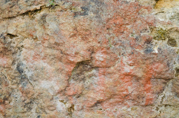 Old stone wall, texture of an ancient cave