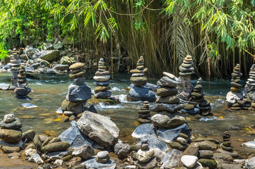 View on stone tower on mountain river on Bali, Indonesia