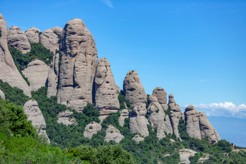 Fototapeta na wymiar Detail of the rocks of Montserrat mountain in Catalunya in a sunny day